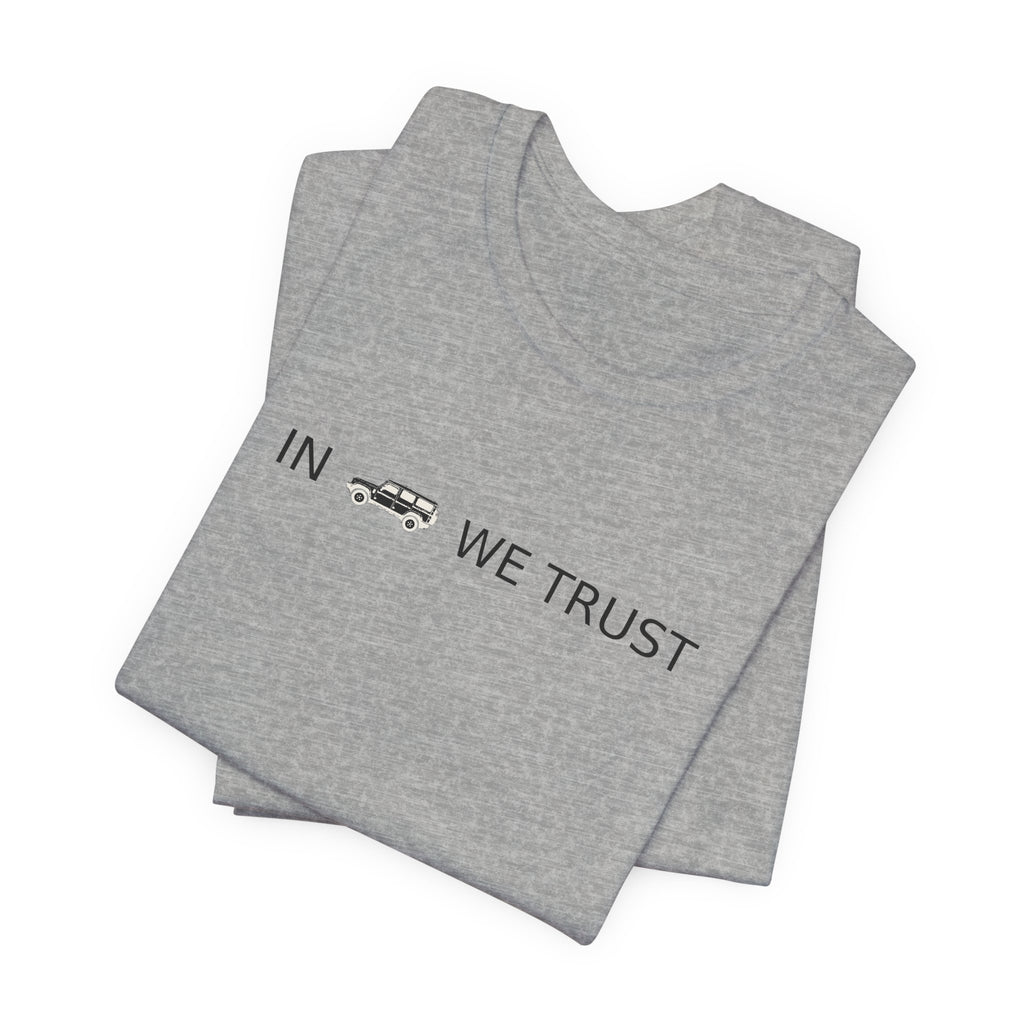 Tee with full-front IN WE TRUST lockup, side-view boxy 4x4 between the words – view 12