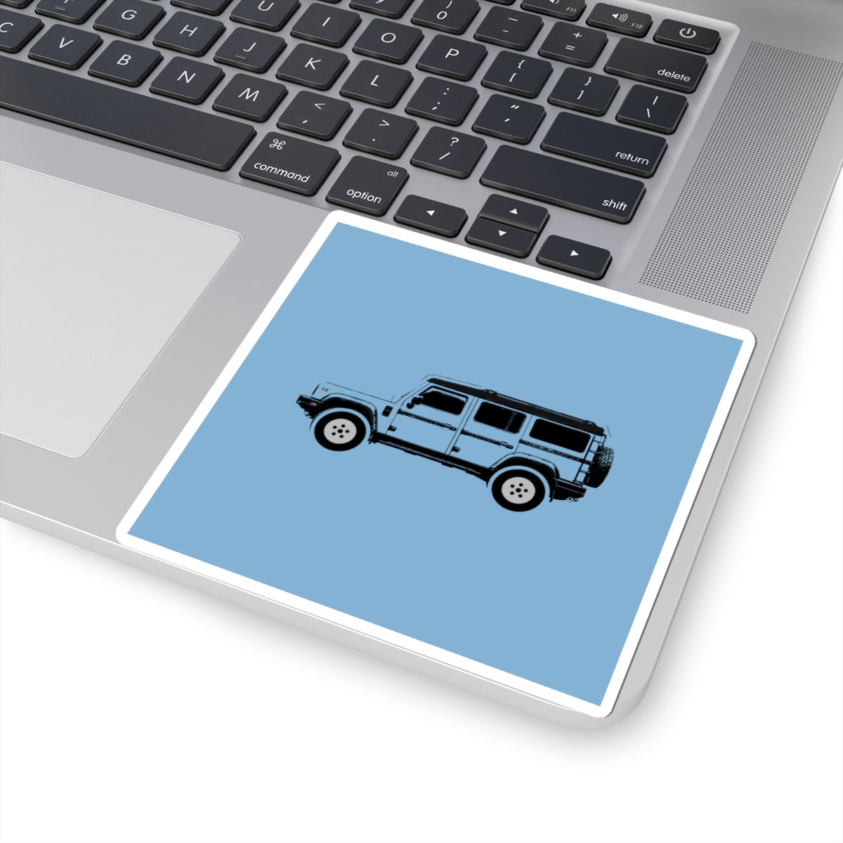 Kiss-cut sticker: Eldoret Blue boxy 4x4 side profile with an inky black roof – view 5