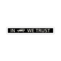 Rectangular sticker reading IN WE TRUST with side-view boxy 4x4 between the words