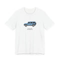 Tee: Eldoret Blue boxy 4x4 in side profile on white field, "Purpose-built. Not dressed up." lettering under the truck, White