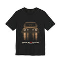 Black tee, front print: 4x4 wading dark water at night, headlights on (warm sepia tones) with BUILT FOR THE DEEP END lettering under GRENADIER wordmark, Black