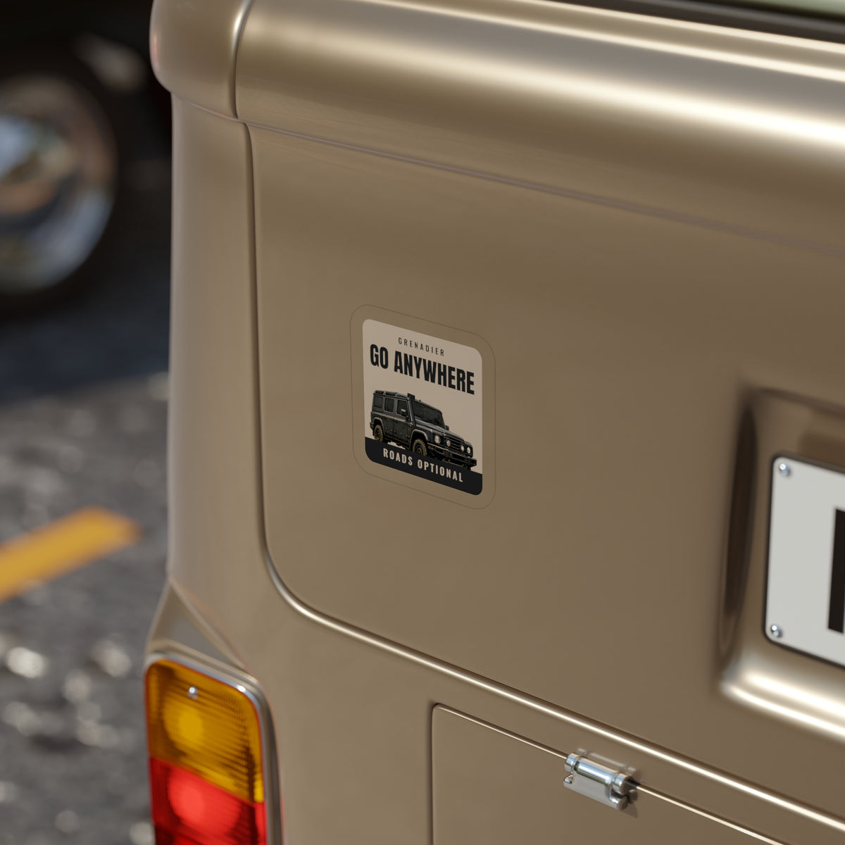 Go Anywhere / Roads Optional die-cut sticker: a black 4x4 wagon on a cream badge with GO ANYWHERE up top and a ROADS OPTIONAL footer – view 4