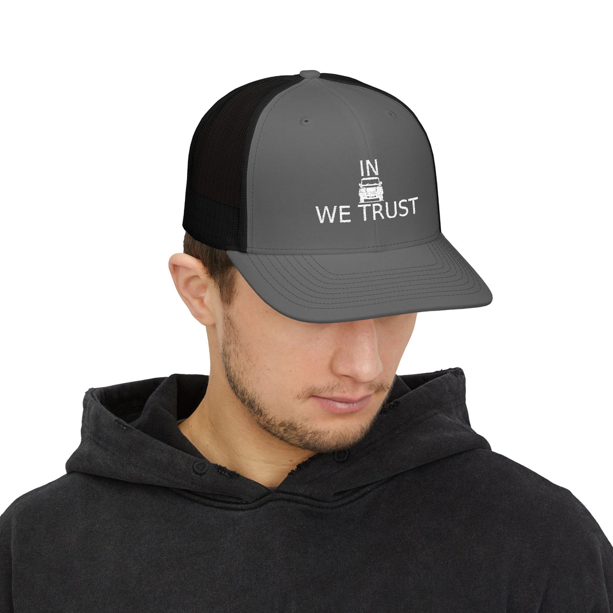 Richardson trucker hat with embroidered IN WE TRUST lockup, front-view boxy 4x4 between the words – view 16