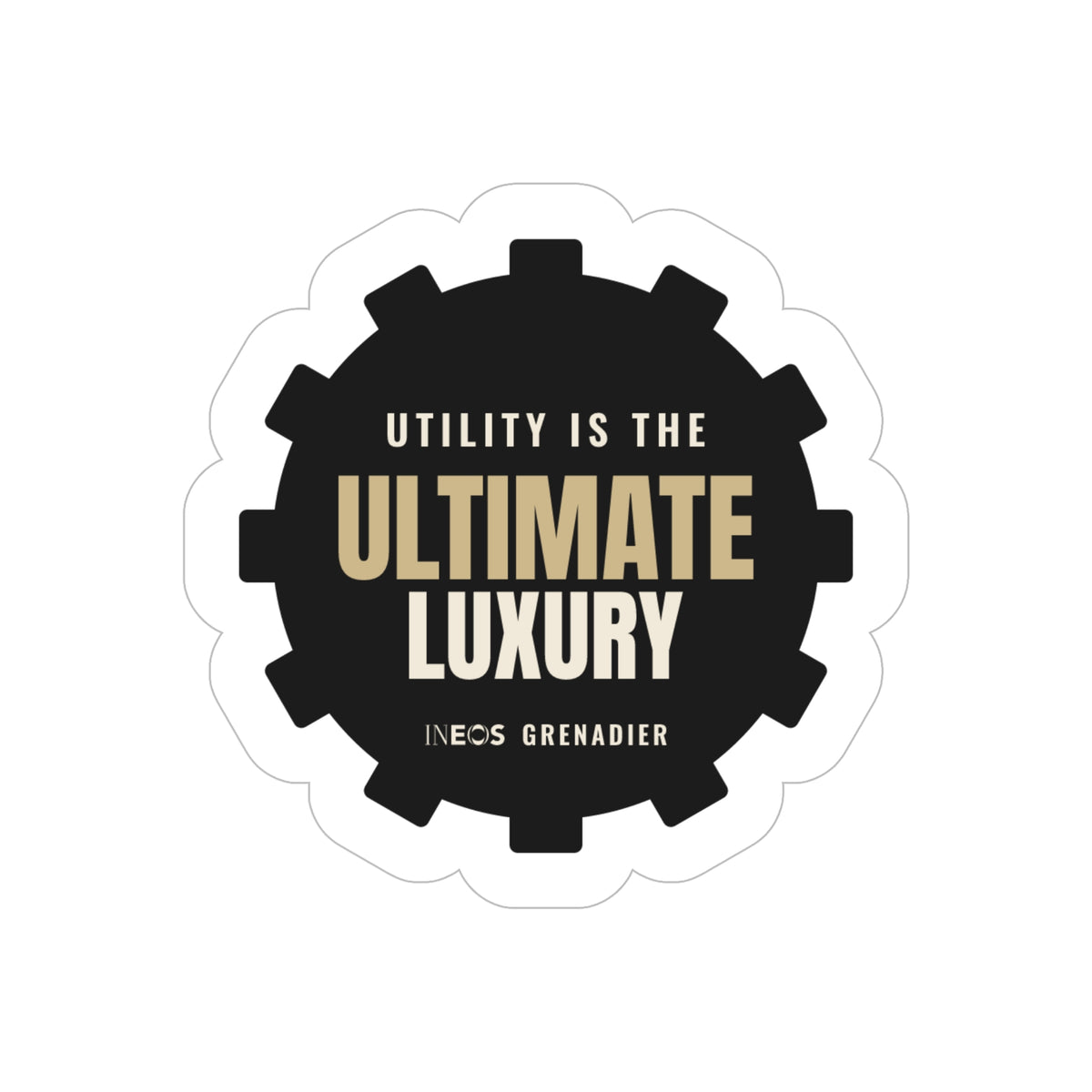 Utility Is the Ultimate Luxury die-cut sticker: UTILITY IS THE ULTIMATE LUXURY lettering in tan and white on a black gear-shaped badge – view 2