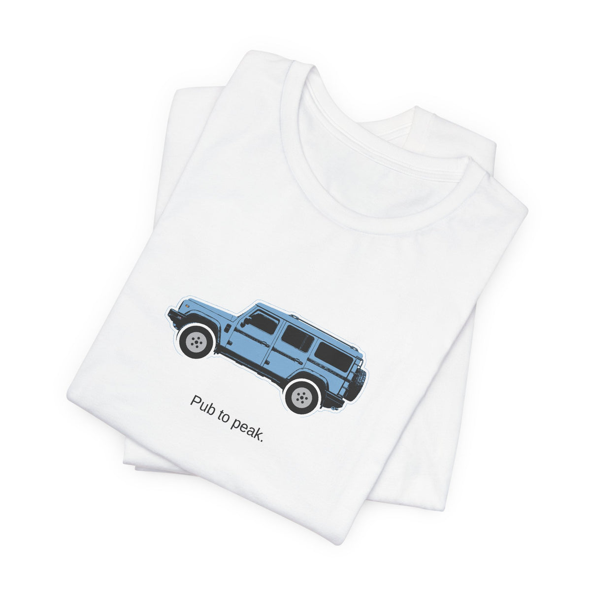 Tee: Eldoret Blue boxy 4x4 in side profile on white field, "Pub to peak." lettering under the truck – view 3