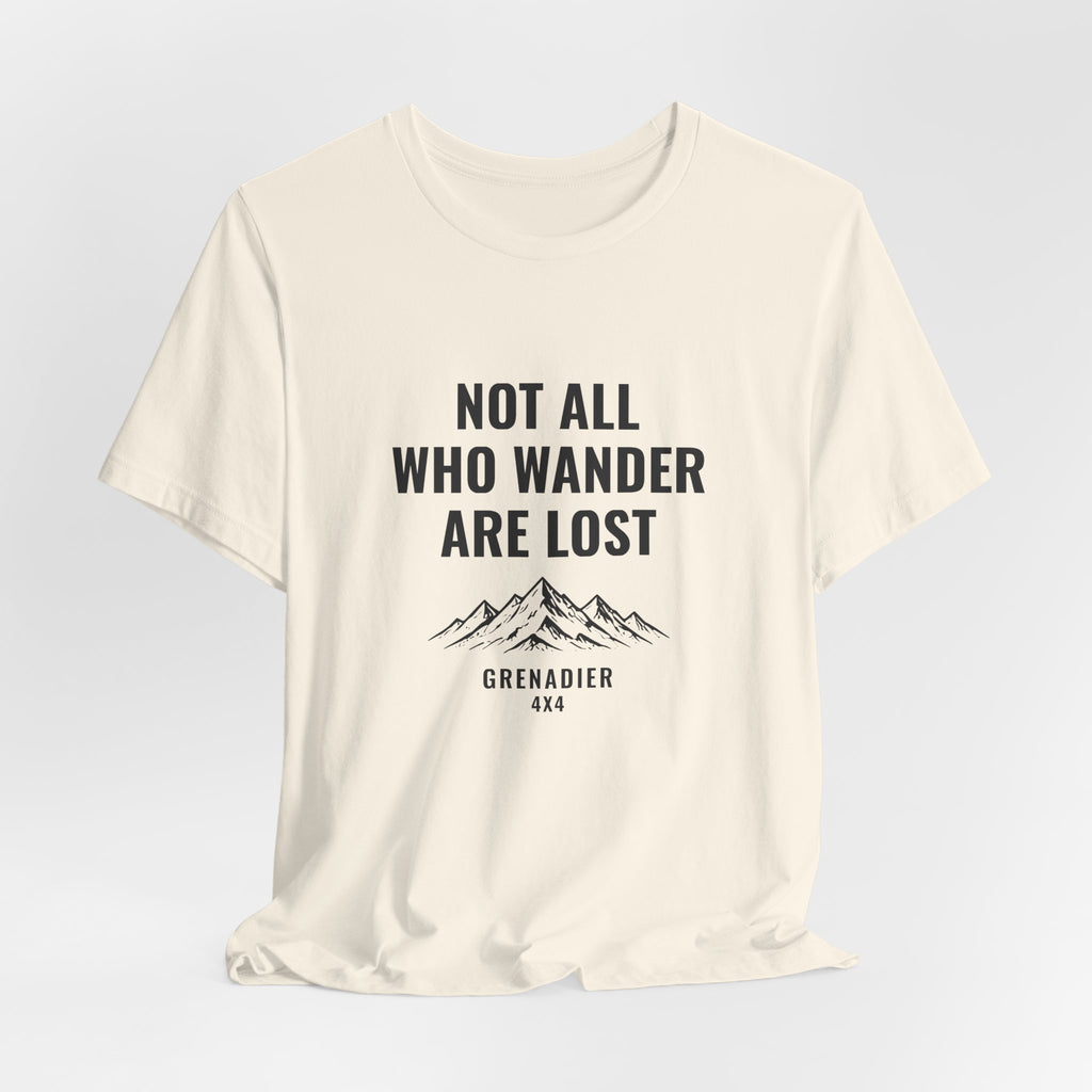 Not All Who Wander Are Lost overland tee with mountain range art, Bella+Canvas 3001 in Natural, hanging 1 view
