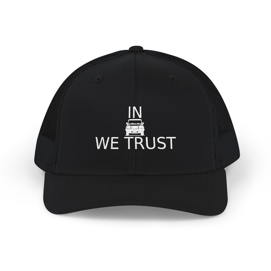 Richardson trucker hat with embroidered IN WE TRUST lockup, front-view boxy 4x4 between the words, Black