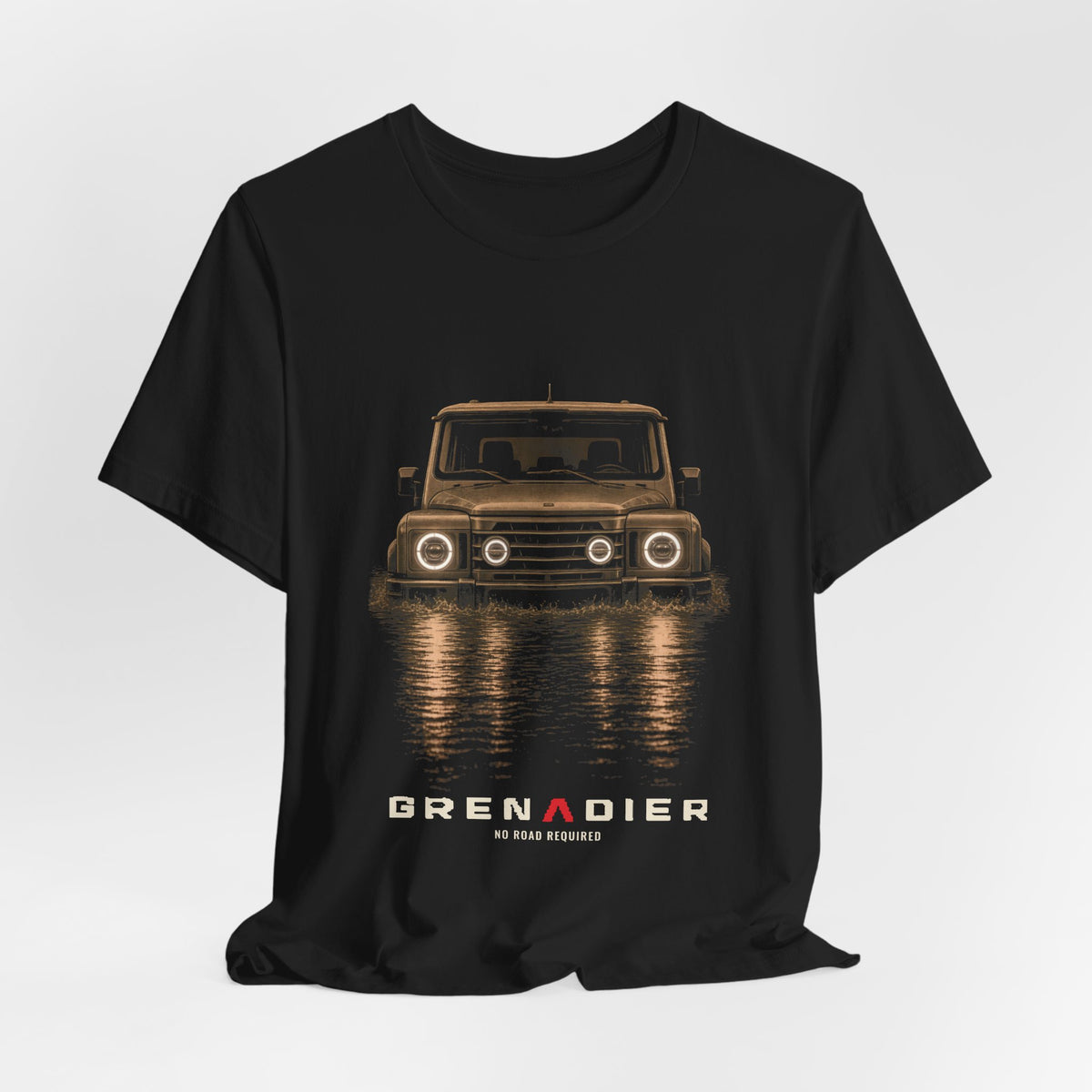 Black tee, front print: 4x4 wading dark water at night, headlights on (warm sepia tones) with NO ROAD REQUIRED lettering under GRENADIER wordmark – view 3