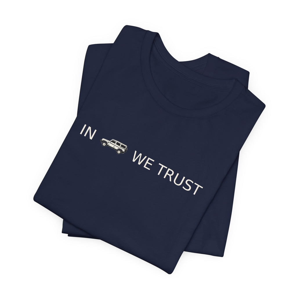 Tee with full-front IN WE TRUST lockup, side-view boxy 4x4 between the words – view 15