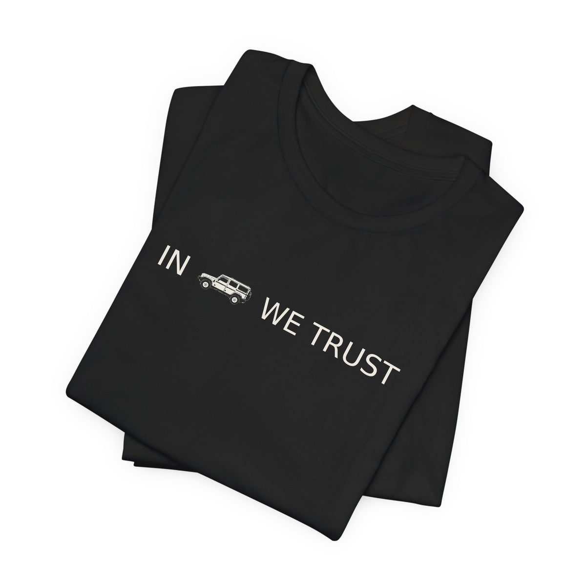 Tee with full-front IN WE TRUST lockup, side-view boxy 4x4 between the words – view 9