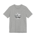 Gravel Grinders round line-art badge: compact crossover with gravel bike on roof rack among pines on tee, Athletic Heather