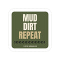 Mud. Dirt. Repeat. die-cut sticker: stacked MUD. DIRT. REPEAT. lettering over a tire-tread chevron strip on an olive green badge