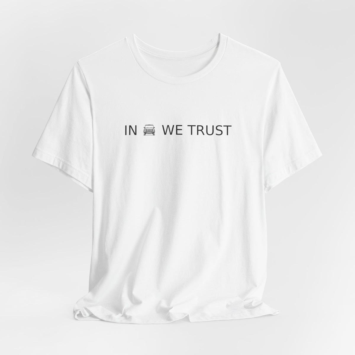 Tee with full-front IN WE TRUST lockup, front-view boxy 4x4 between the words – view 7