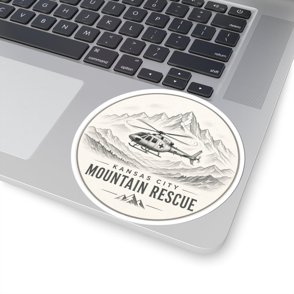 Round sticker: Kansas City Mountain Rescue, helicopter flying past sketched mountain range – view 5