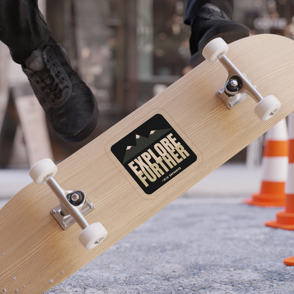 Explore Further die-cut sticker: mountain peaks above big EXPLORE FURTHER lettering in cream and tan on a black badge – view 9