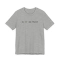 Tee with full-front IN WE TRUST lockup, side-view boxy 4x4 between the words, Athletic Heather