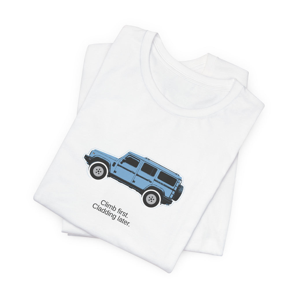 Tee: Eldoret Blue boxy 4x4 in side profile on white field, "Climb first. Cladding later." lettering under the truck – view 3