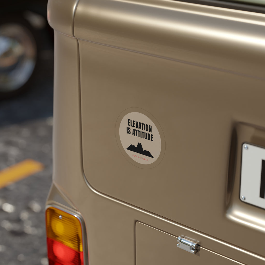 Elevation Is Attitude die-cut sticker: ELEVATION IS ATTITUDE lettering over a black mountain on a round cream badge – view 6