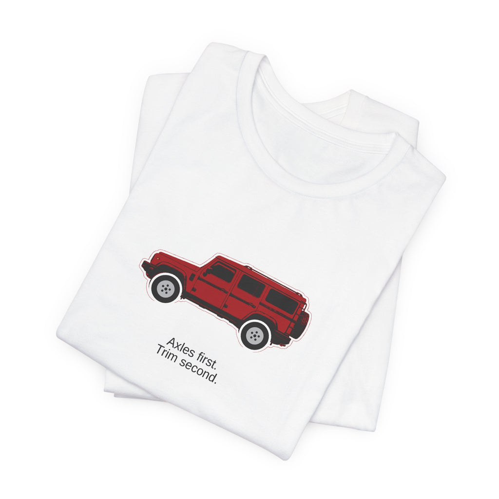 Tee: Devil Red boxy 4x4 in side profile on white field, "Axles first. Trim second." lettering under the truck – view 3