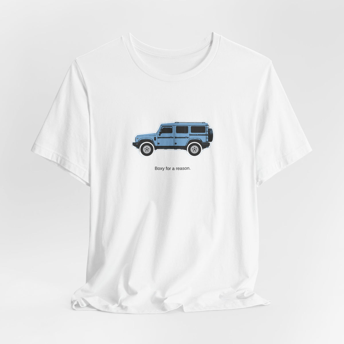 Tee: Eldoret Blue boxy 4x4 in side profile on white field, "Boxy for a reason." lettering under the truck – view 4