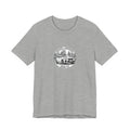 Gravel Grinders round line-art badge: luxury SUV with gravel bike on roof rack among pines on tee, Athletic Heather