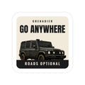 Go Anywhere / Roads Optional die-cut sticker: a black 4x4 wagon on a cream badge with GO ANYWHERE up top and a ROADS OPTIONAL footer