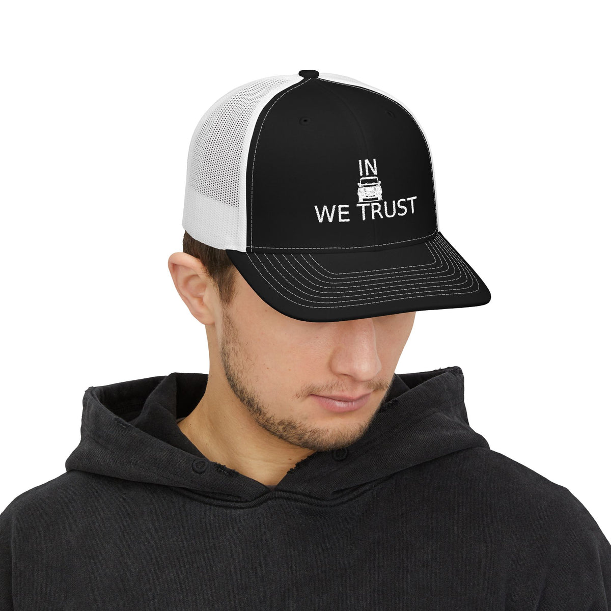 Richardson trucker hat with embroidered IN WE TRUST lockup, front-view boxy 4x4 between the words – view 7
