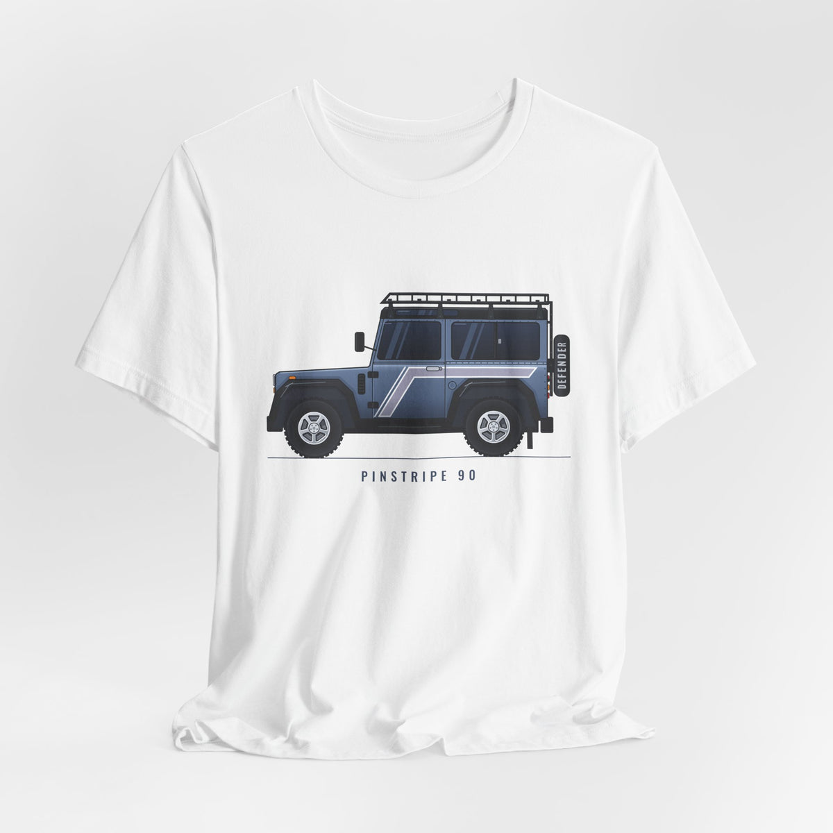White tee, chest print: slate-blue boxy 90 4x4 in side profile with pinstripe flash and roof rack; PINSTRIPE 90 lettering – view 3