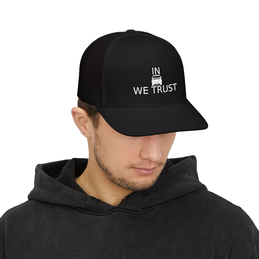 Richardson trucker hat with embroidered IN WE TRUST lockup, front-view boxy 4x4 between the words – view 13