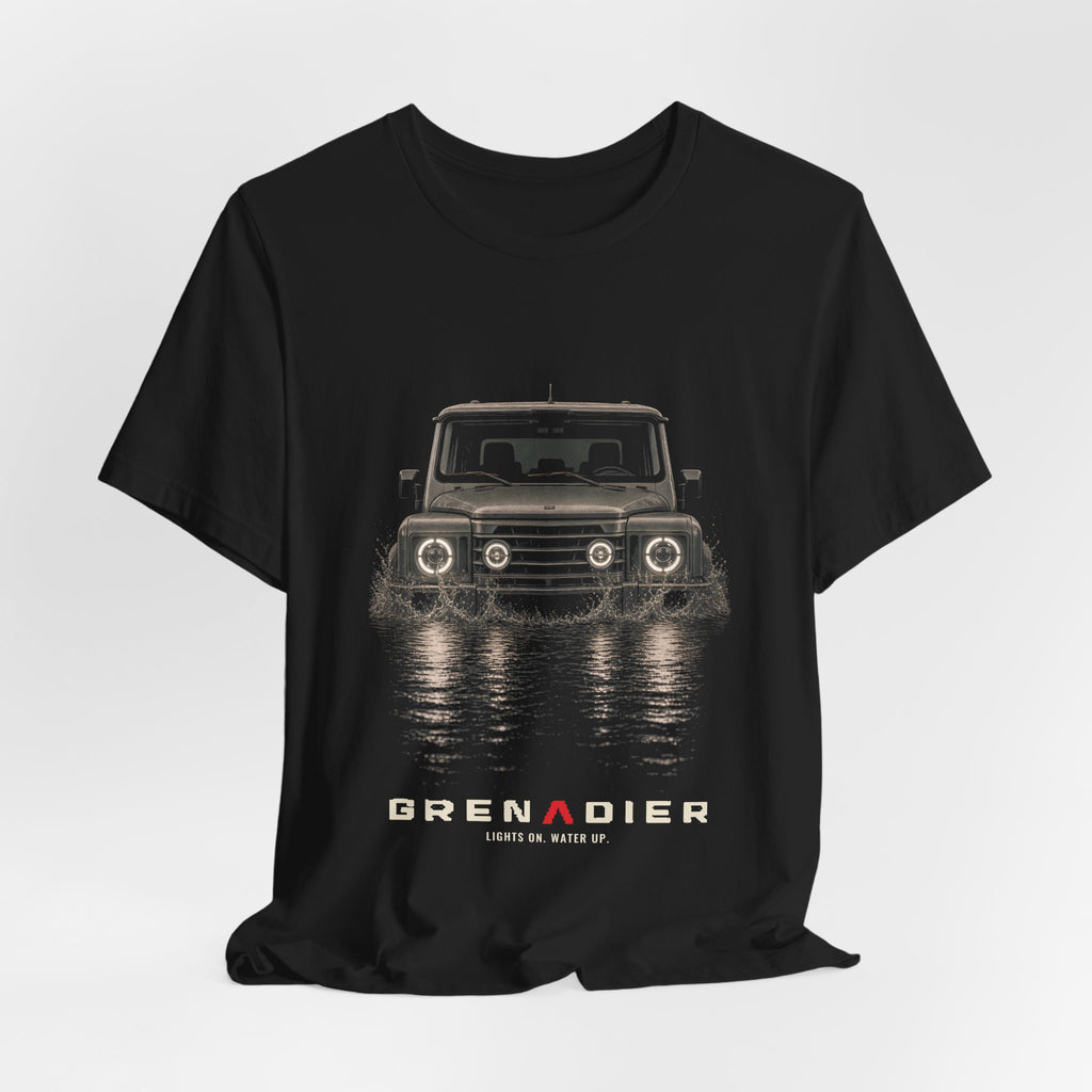 Black tee, front print: 4x4 wading dark water at night, headlights on (splash of water across the bow) with LIGHTS ON. WATER UP. lettering under GRENADIER wordmark – view 3