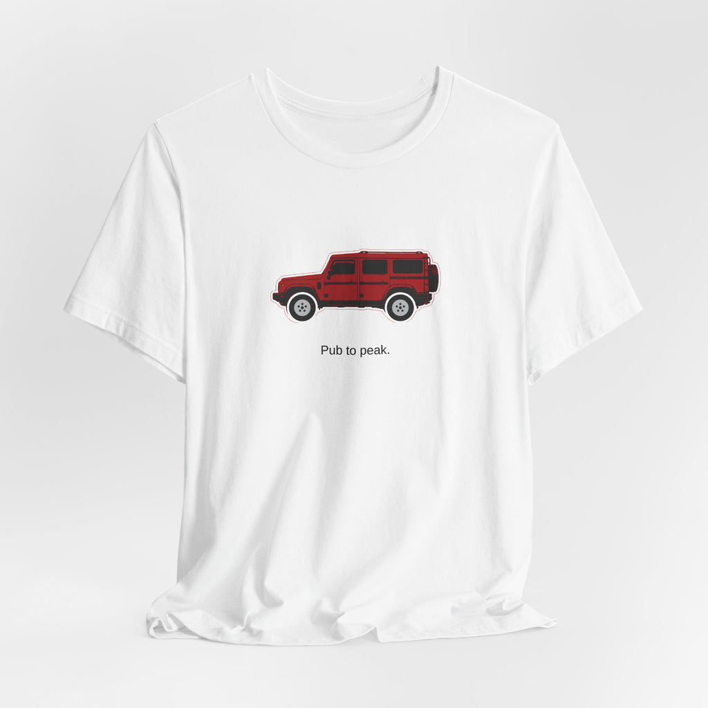 Tee: Devil Red boxy 4x4 in side profile on white field, "Pub to peak." lettering under the truck – view 4