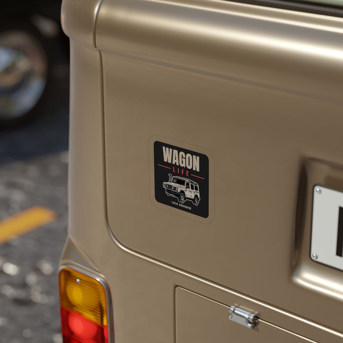 Wagon Life die-cut sticker: WAGON LIFE lettering over a white side-profile 4x4 wagon on a black badge – view 6