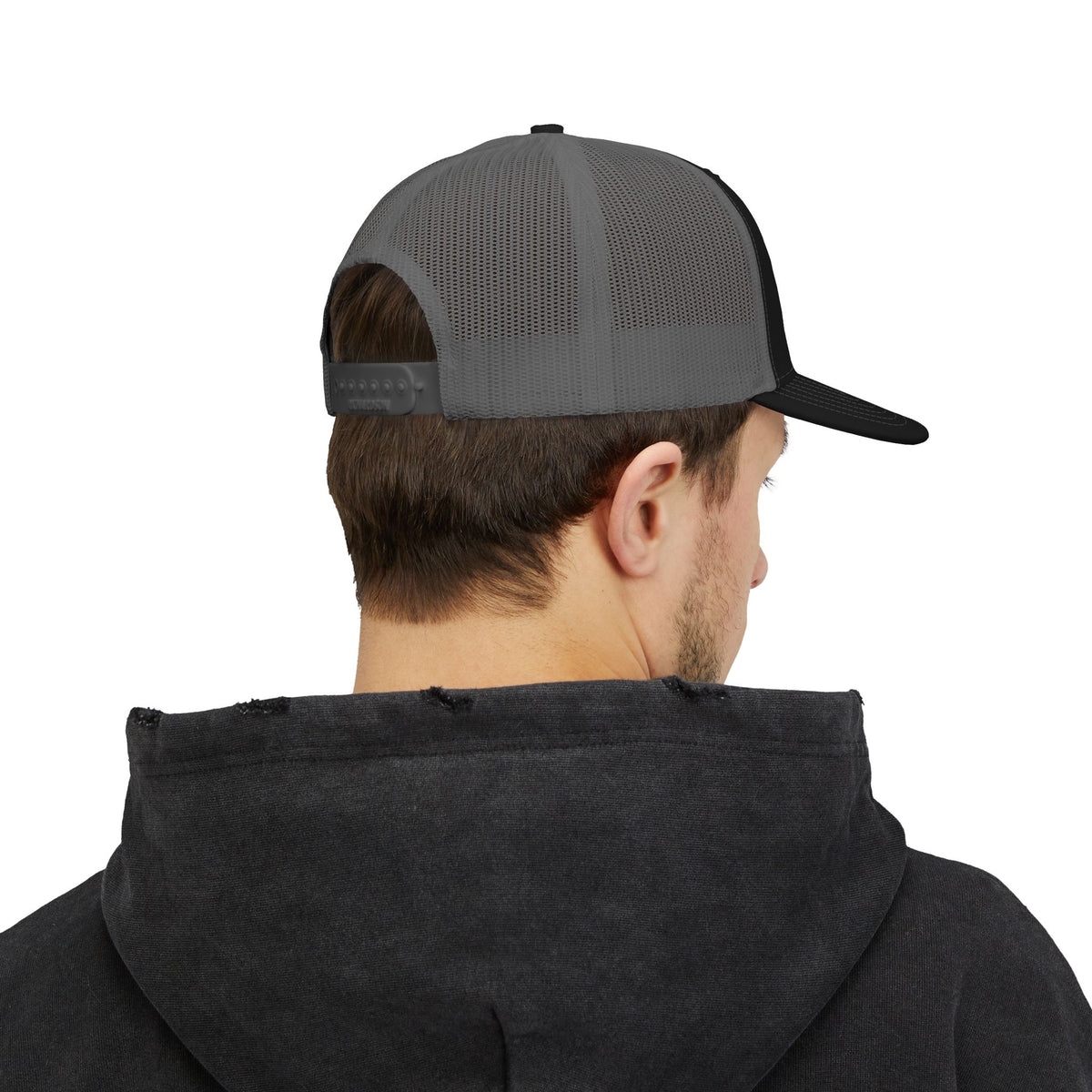 Richardson trucker hat with embroidered IN WE TRUST lockup, side-view boxy 4x4 between the words – view 11