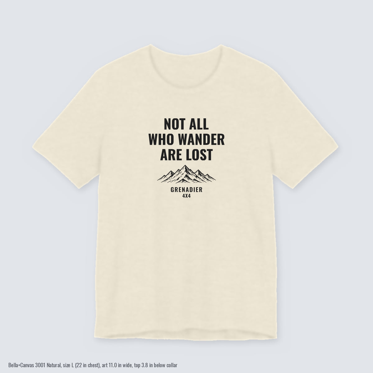 Not All Who Wander Are Lost overland tee with mountain range art on a Natural Bella+Canvas 3001 tee, size L flat lay